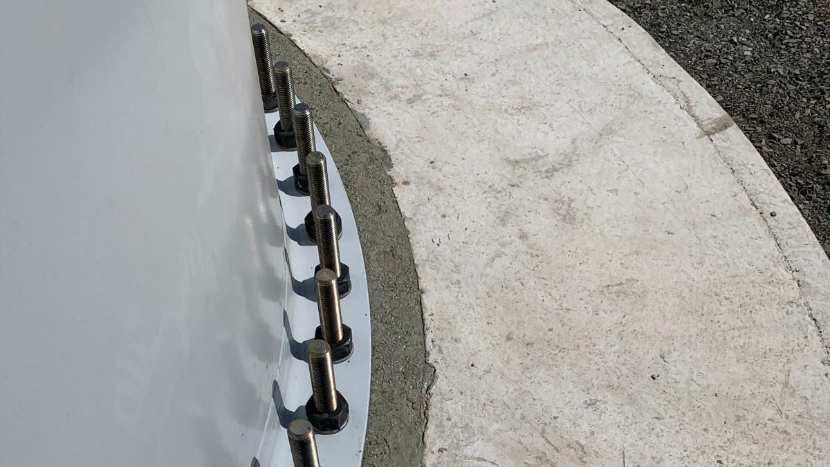 Industrial bolts on curved metal structure
