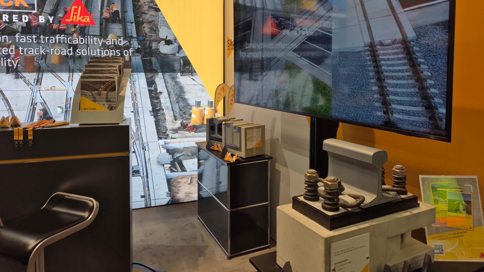 Trade show booth showcasing Sika construction solutions