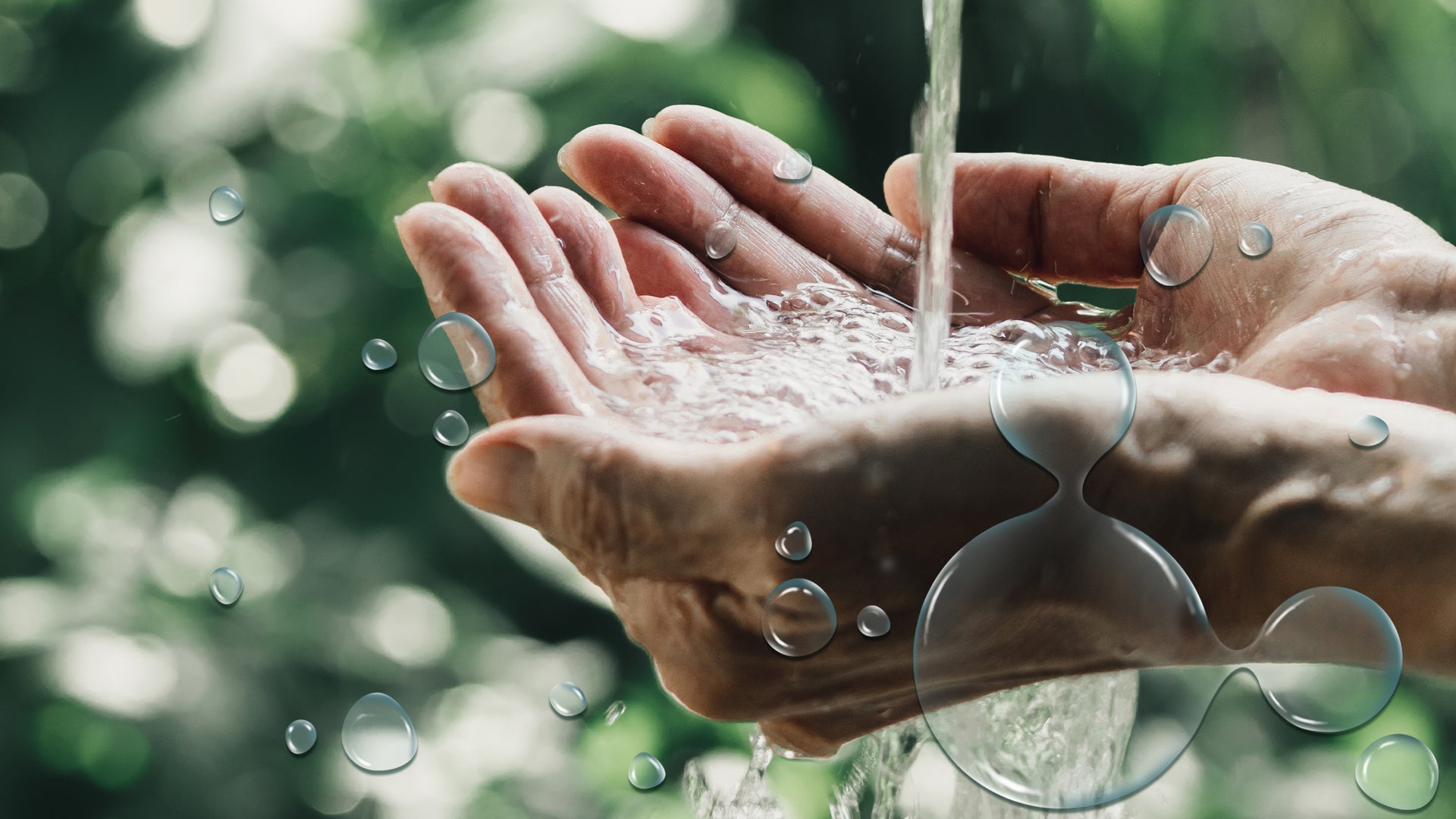 Hand holding water green background