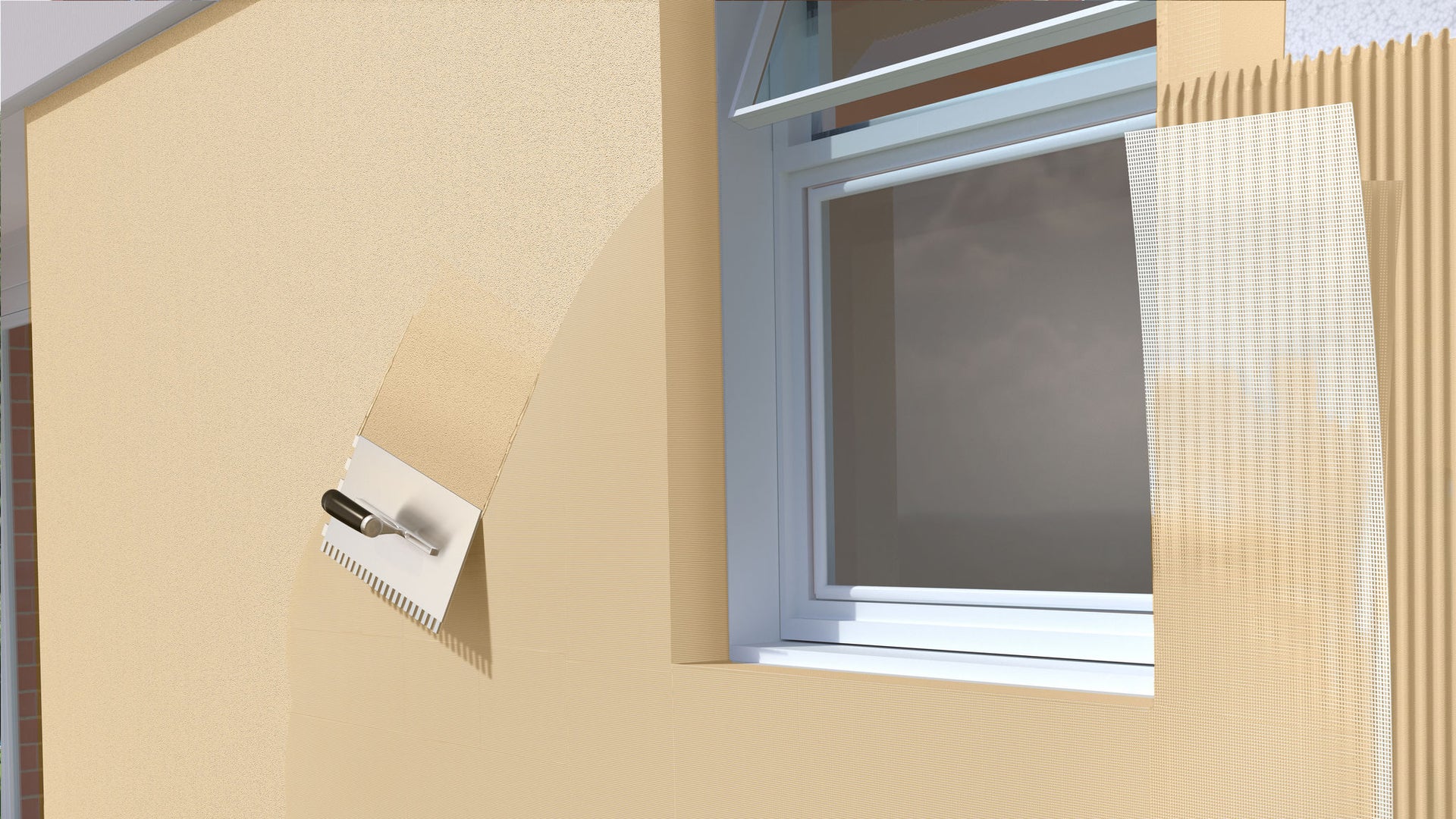 A close-up of a textured exterior wall with a beige finish.