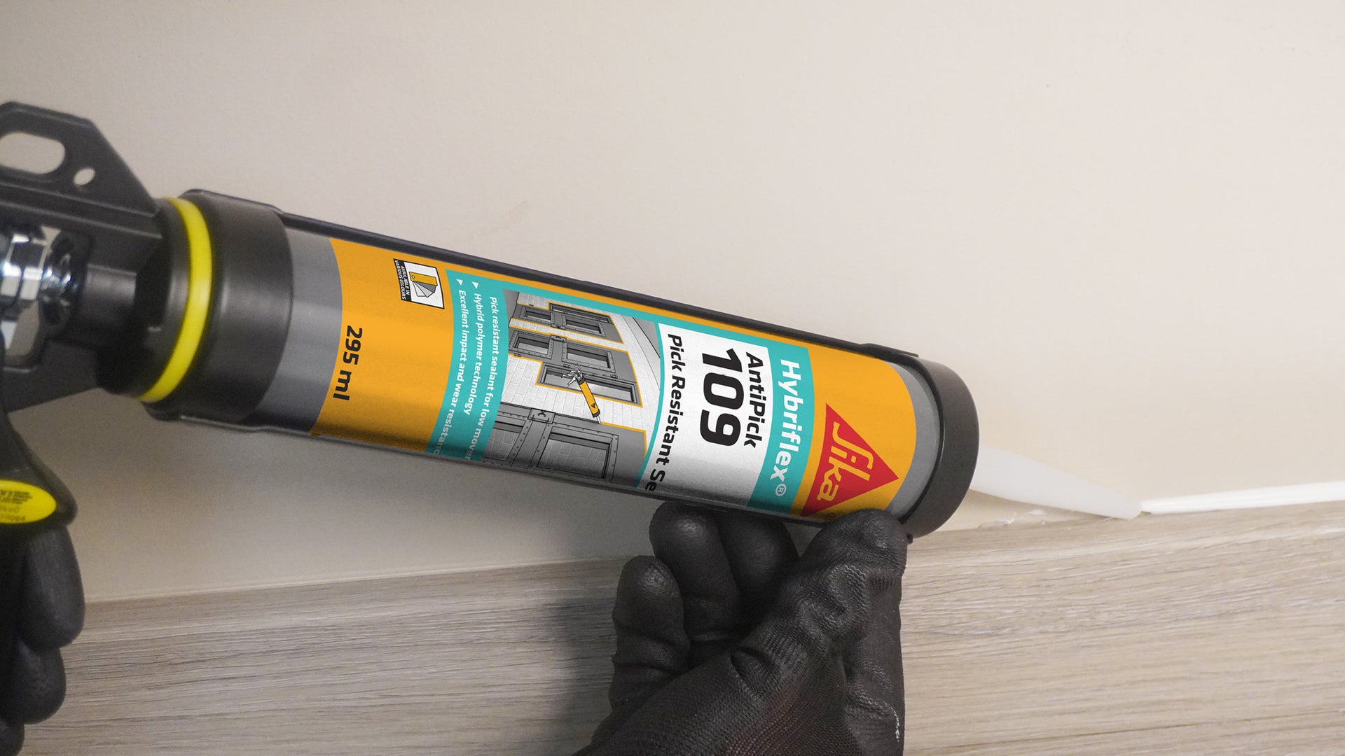Person applying Sika Hybriflex Anti Pick 109