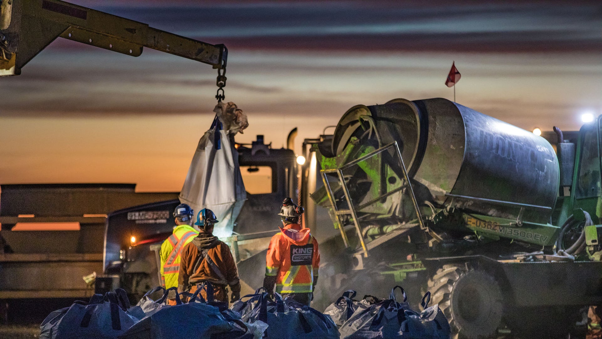 men above mine with machinery