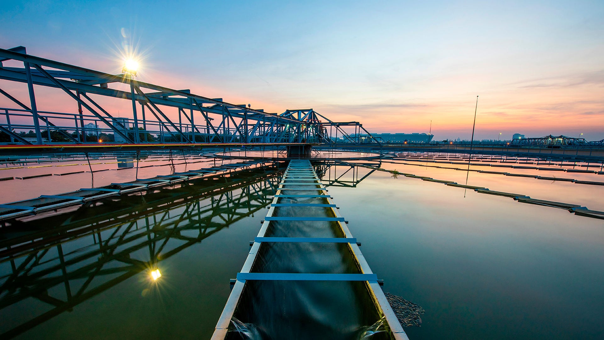 Industrial water treatment plant at sunset