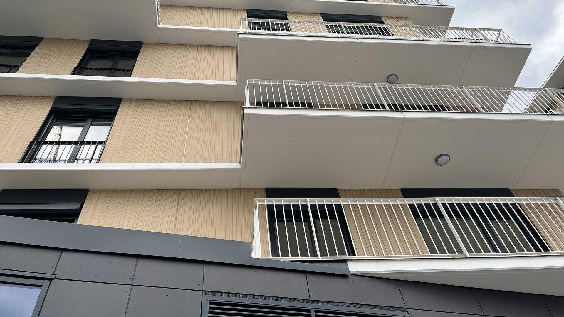 Modern apartment building with geometric balconies