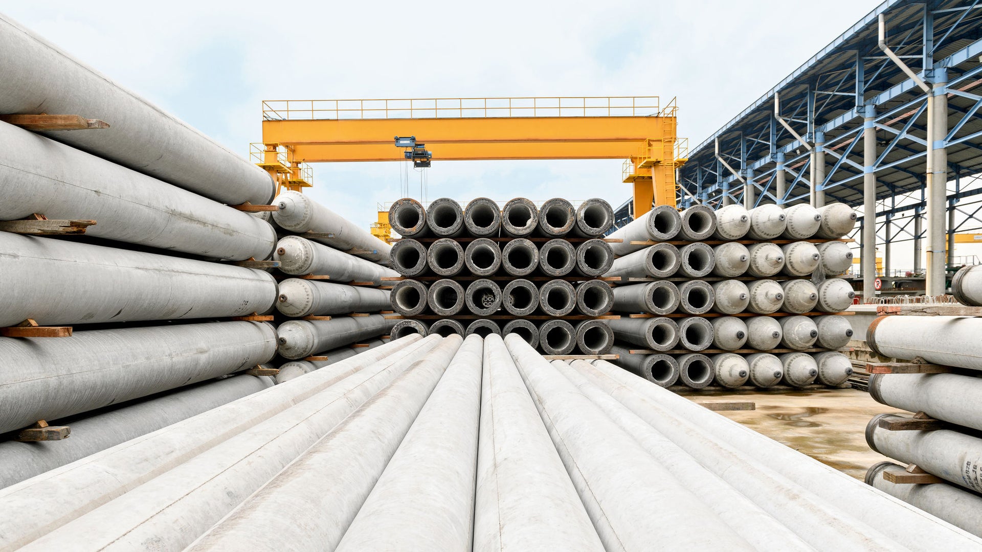 Precast concrete tubes stacked in piles