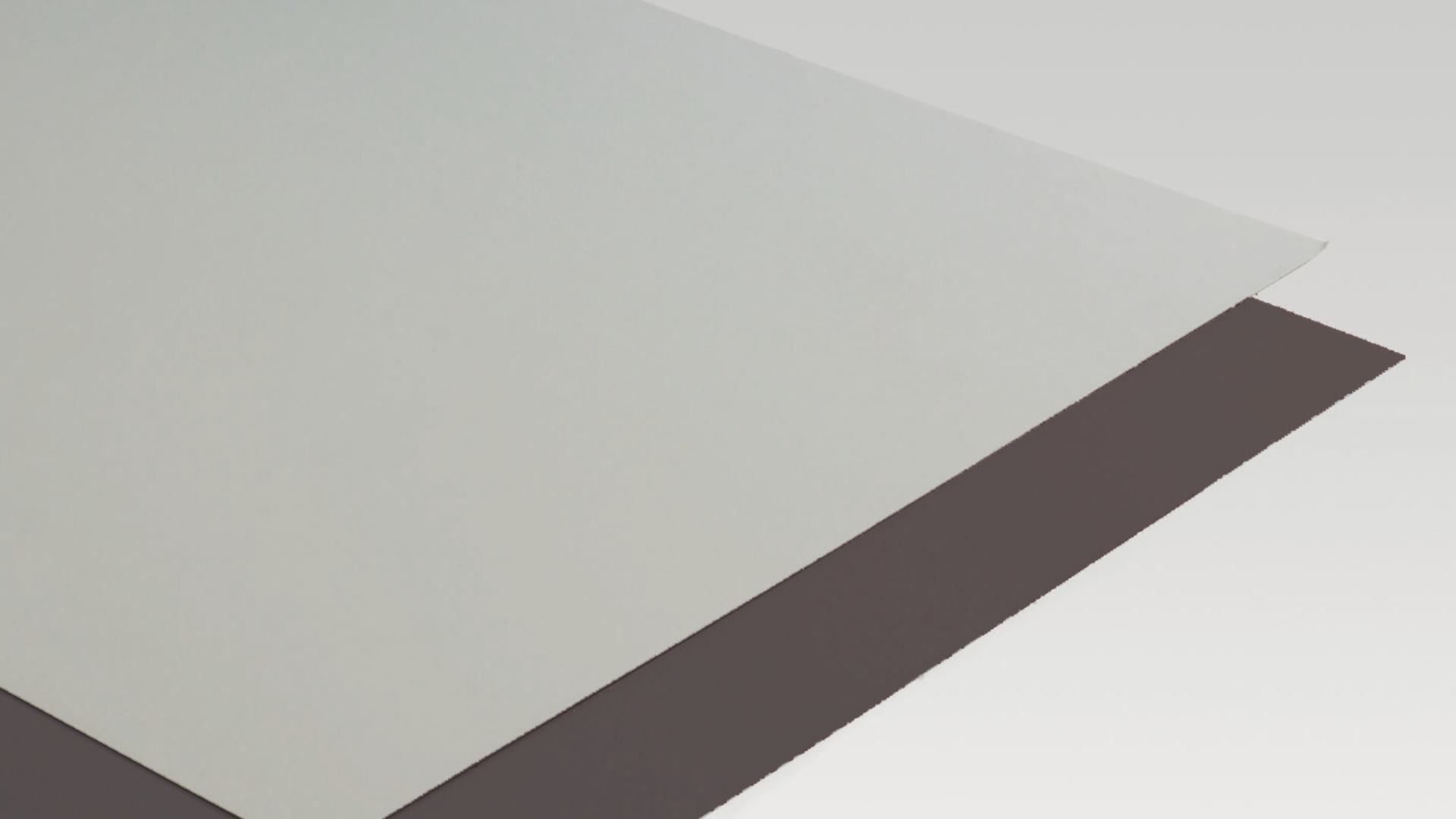 Two Overlapping Sheets on Neutral Background
