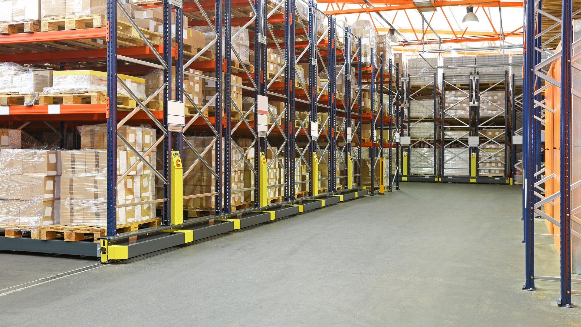 Organized warehouse aisle with pallet racking