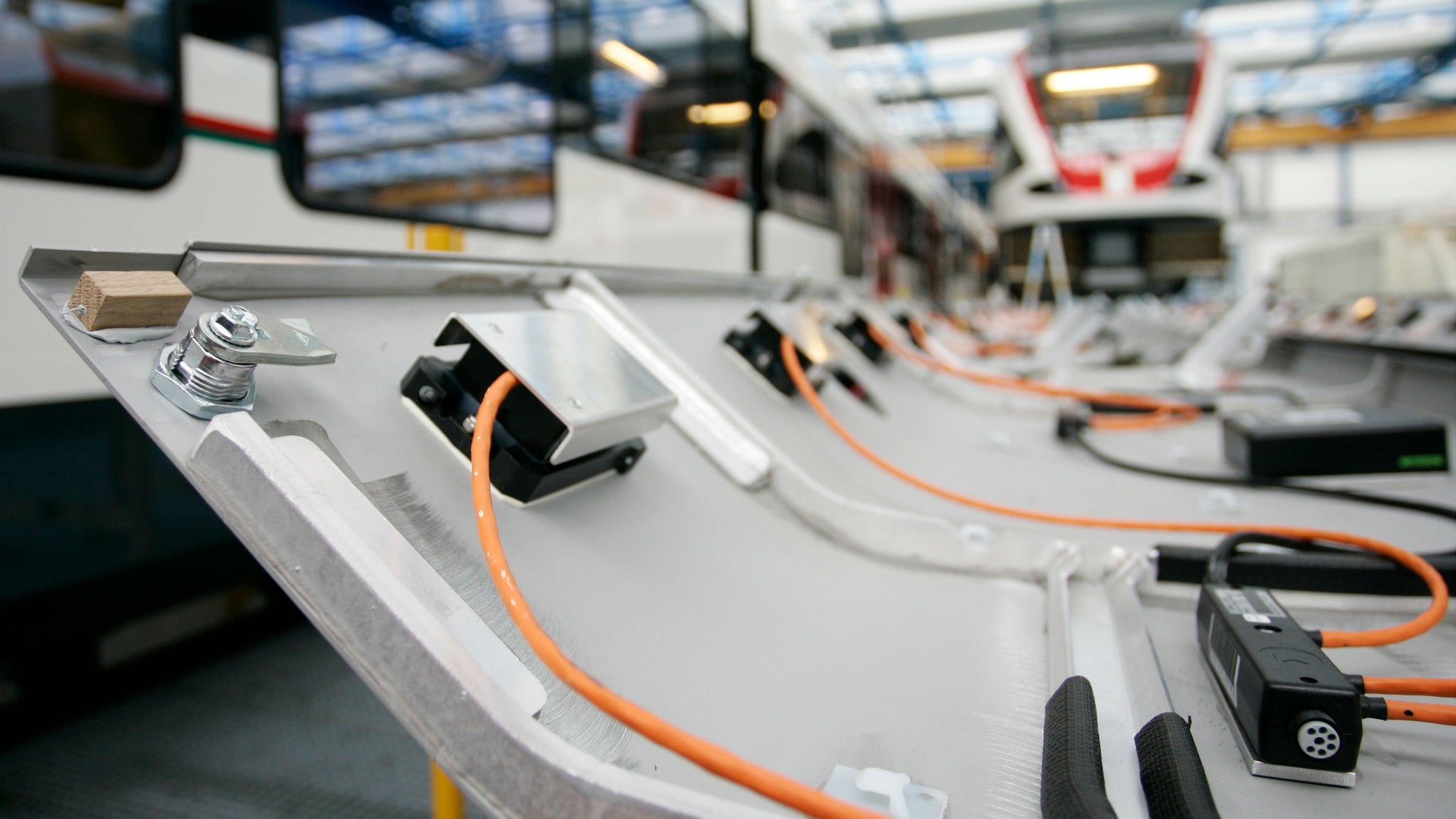 Electric train assembly line with wiring detail
