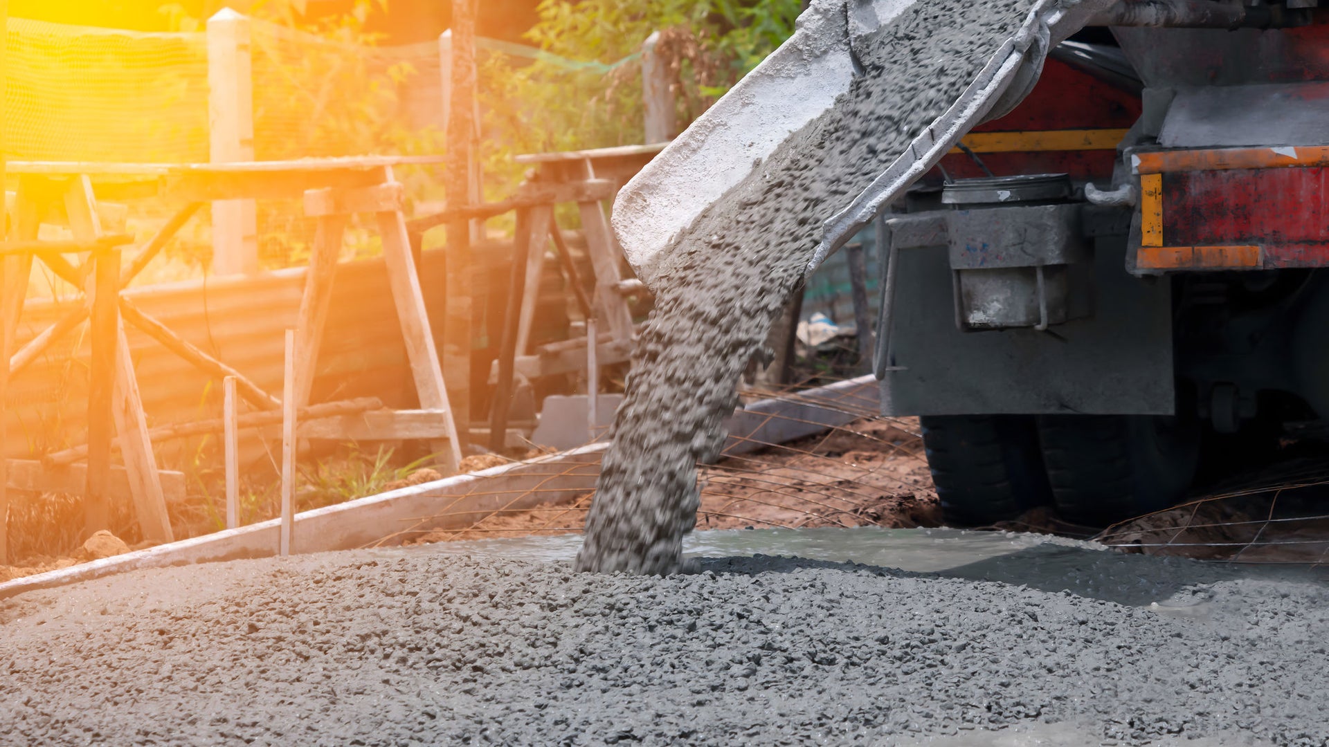 Fresh Concrete Pouring at Construction Site