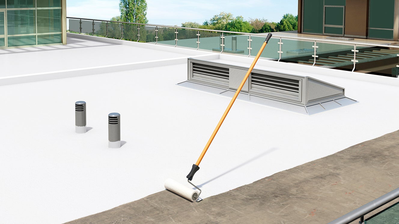 Liquid plastic is applied to the roof for waterproofing