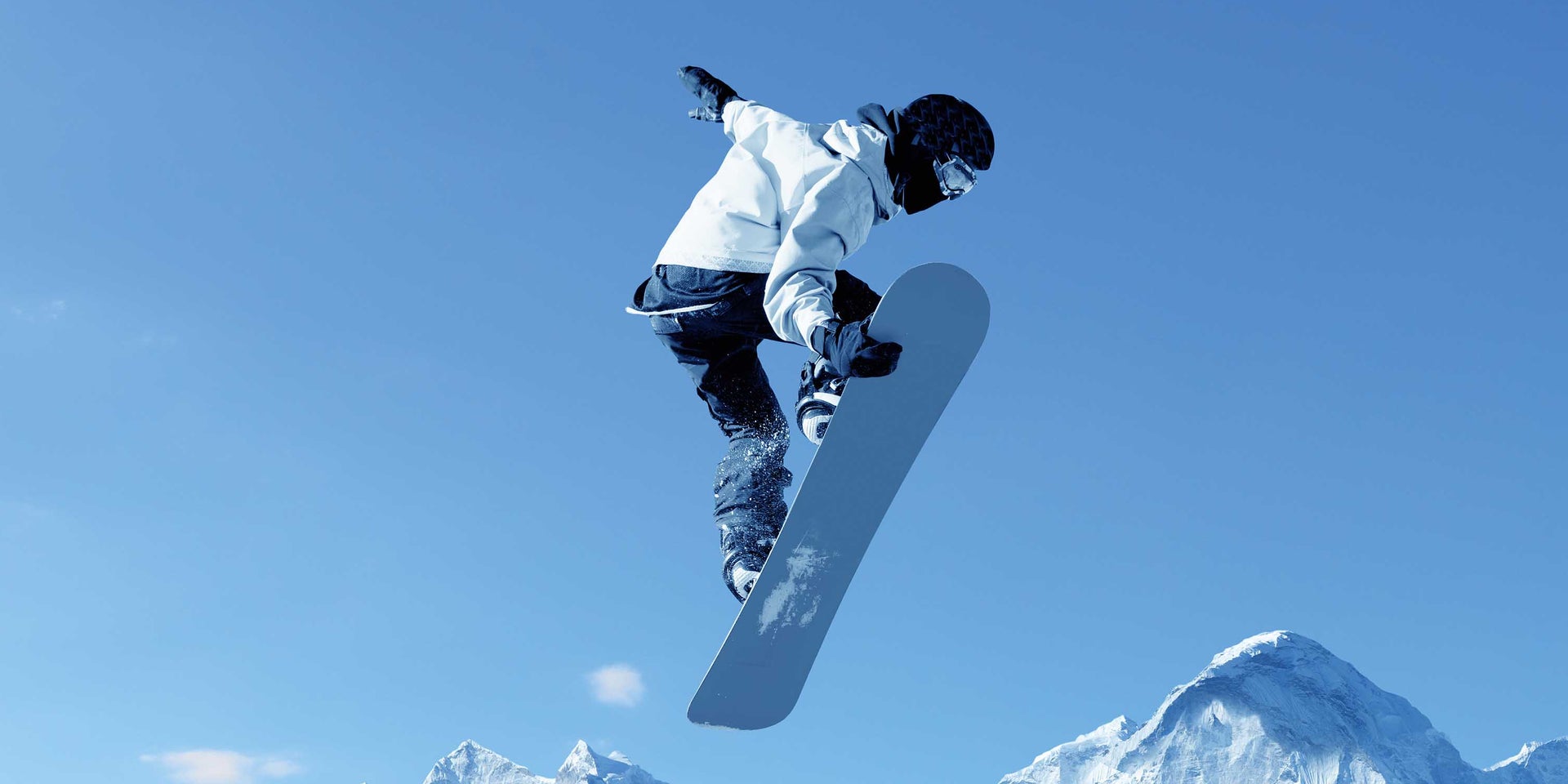 Person snowboarding in the mountain
