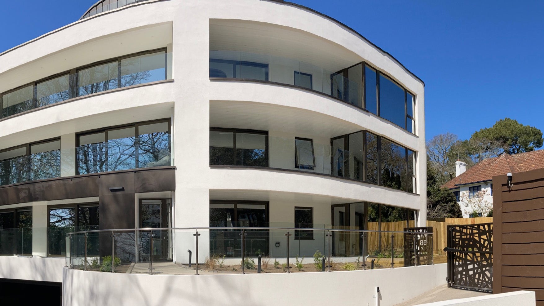 Modern white building with curved design