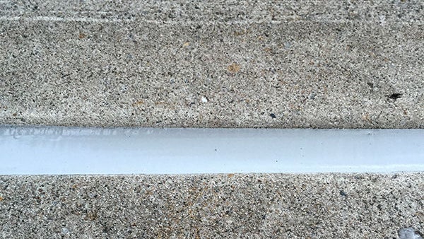 DIY Sealing A Sidewalk Joint Using Sikaflex Self-Leveling Sealant