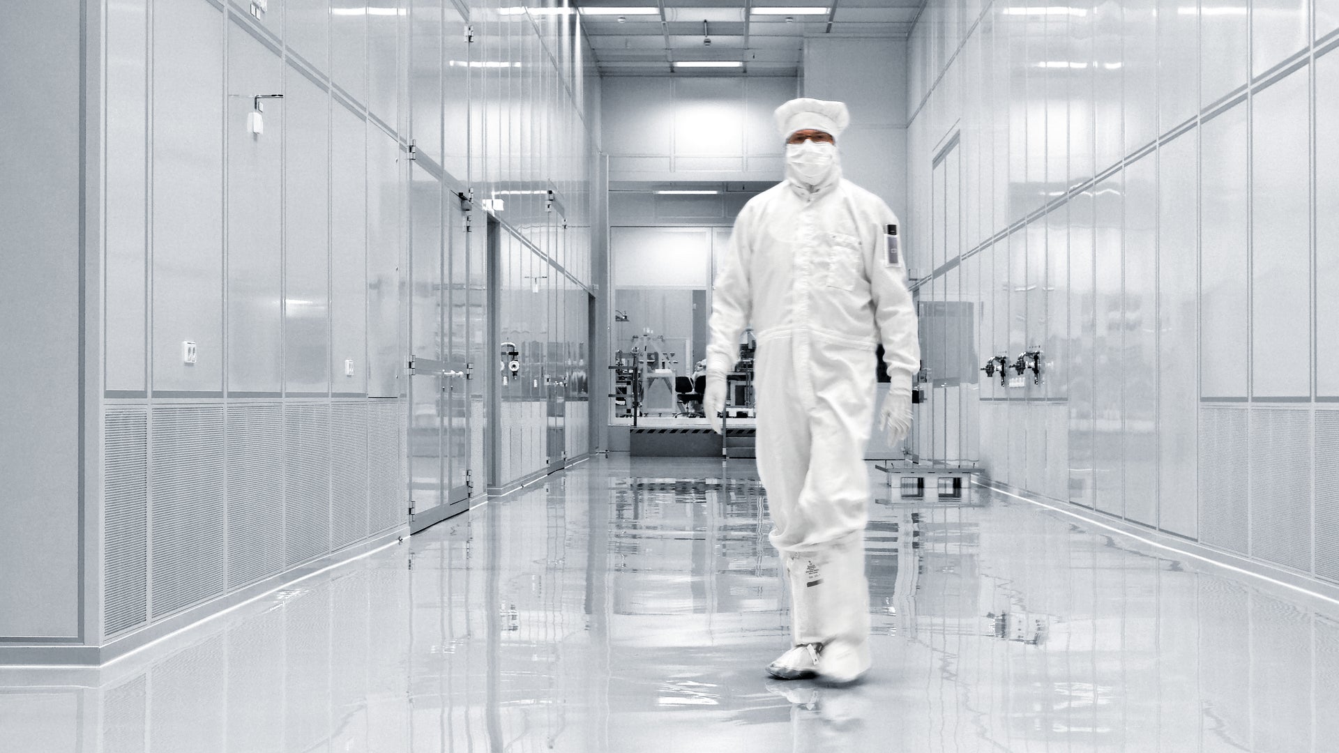Man with mask on in clean sterile area sterile - iCure