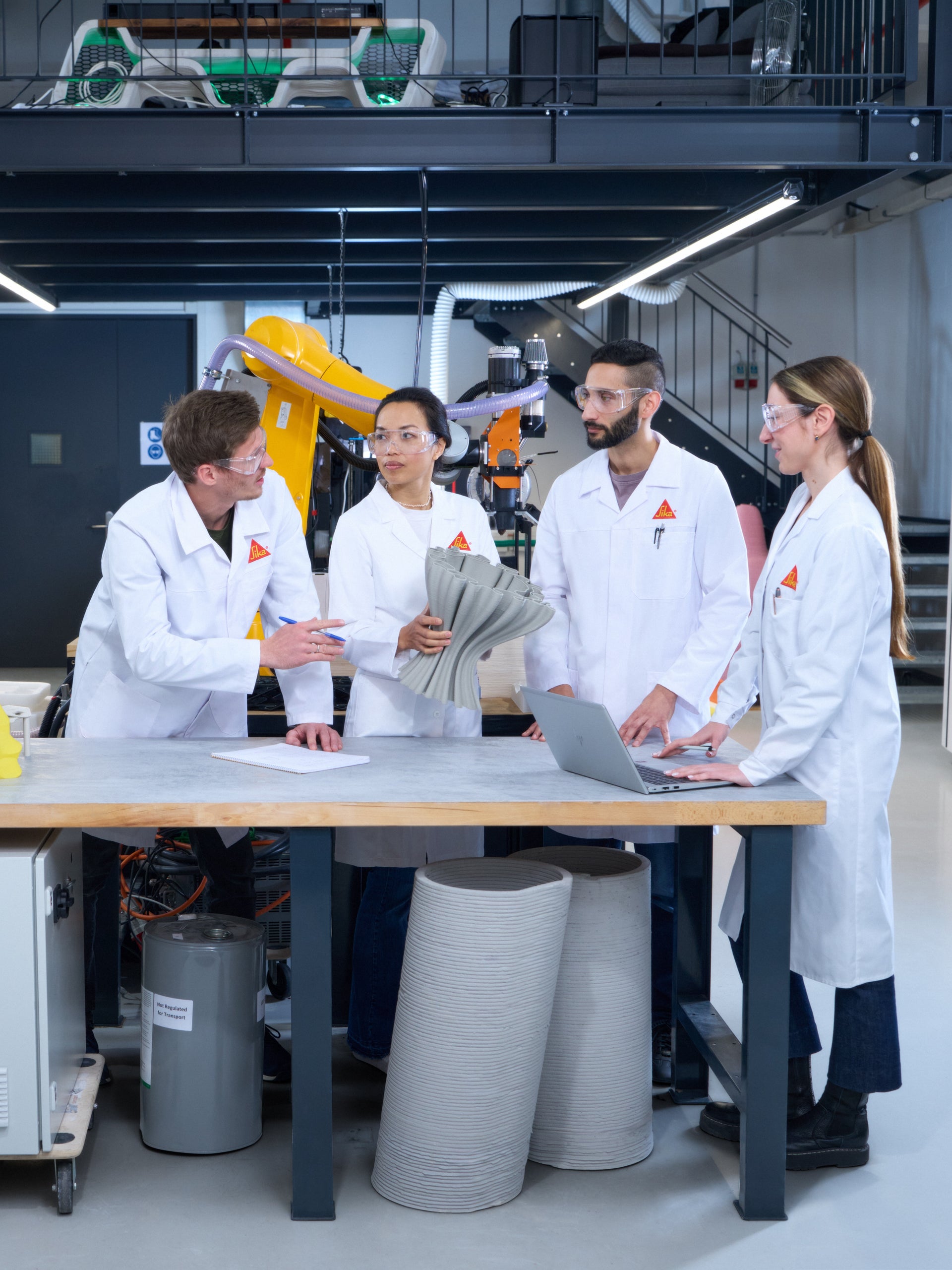 Engineers Collaborate in Modern Robotics Laboratory