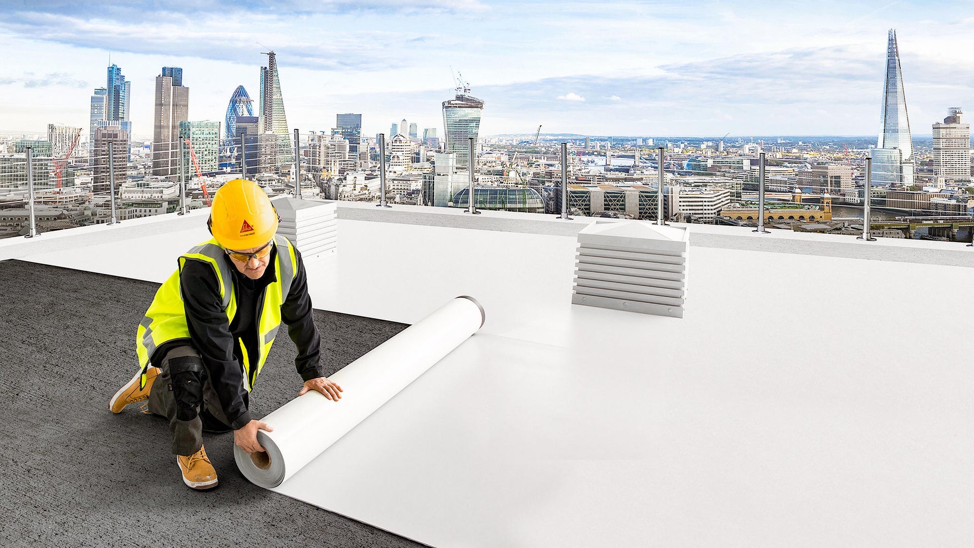 Worker Installing White Roofing Membrane on City Rooftop