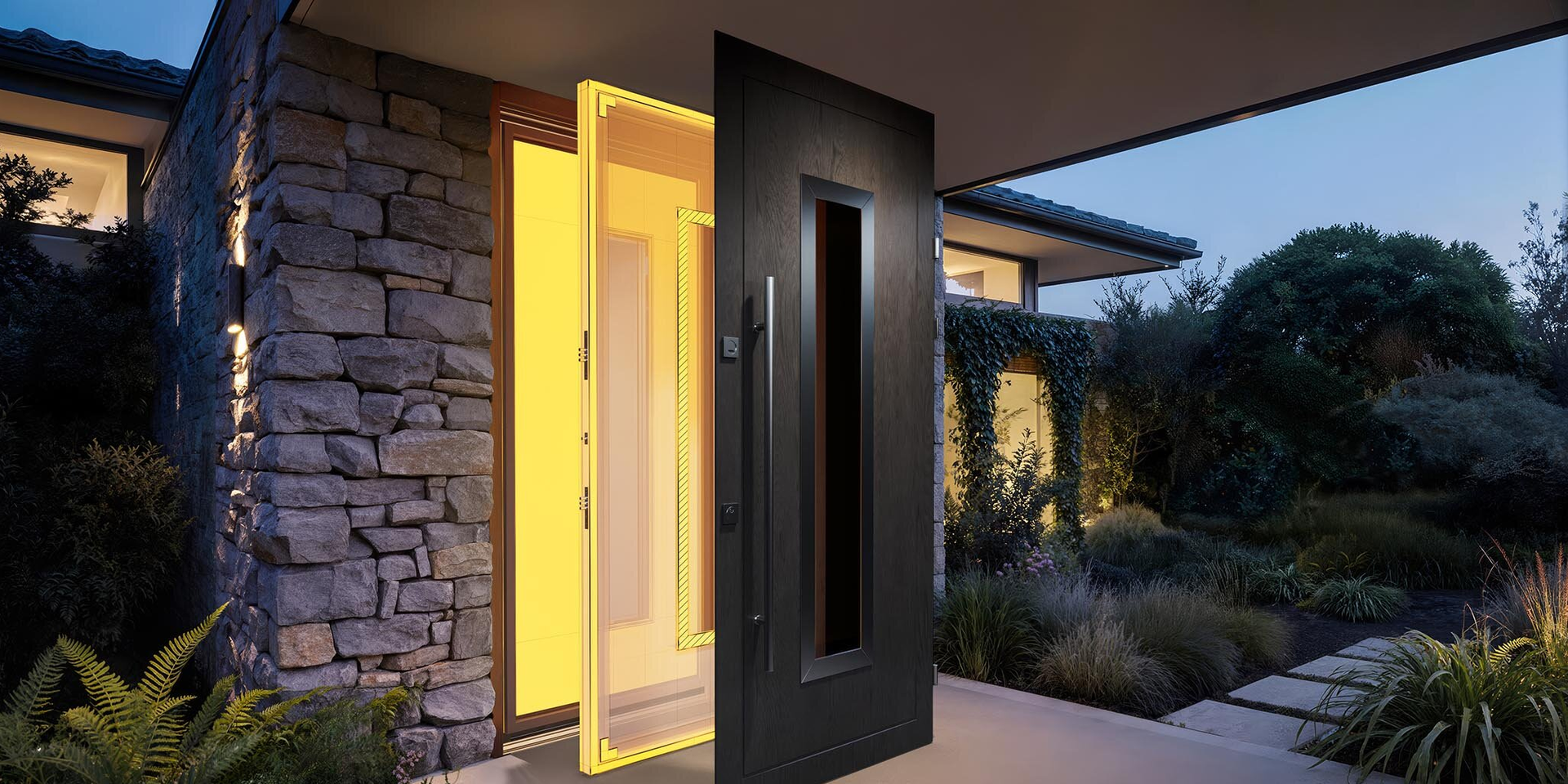 Modern front door with glowing yellow interior light