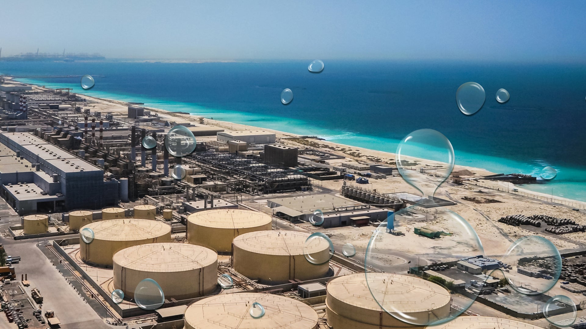desalination plant next to sea water from above birds eye view