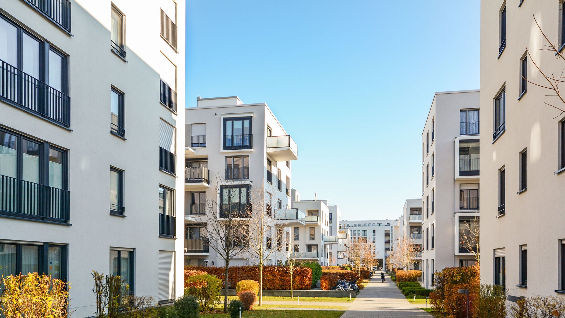 Modern apartment courtyard in sunny residential complex
