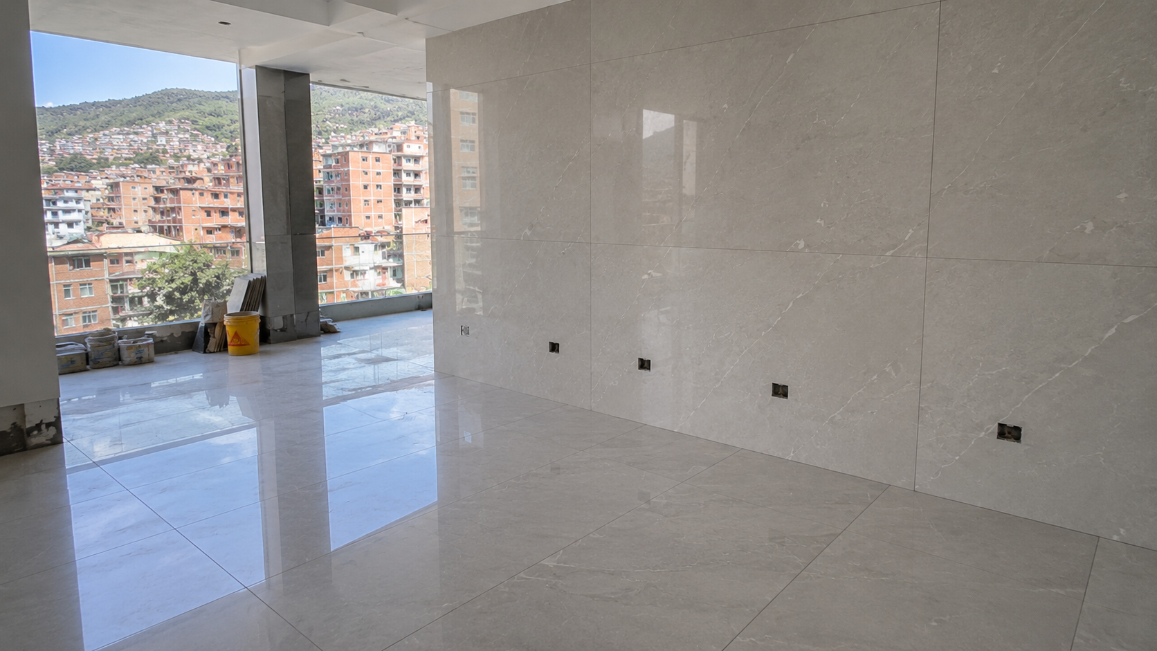 Modern empty apartment with marble flooring
