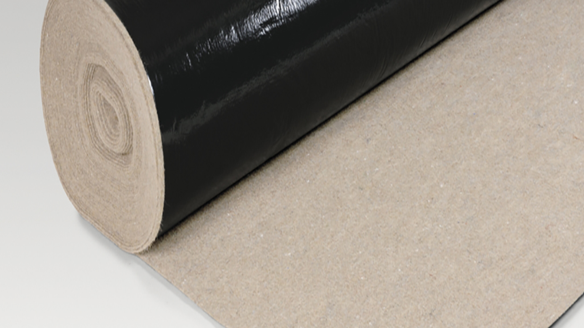 Rolled black insulation material on surface