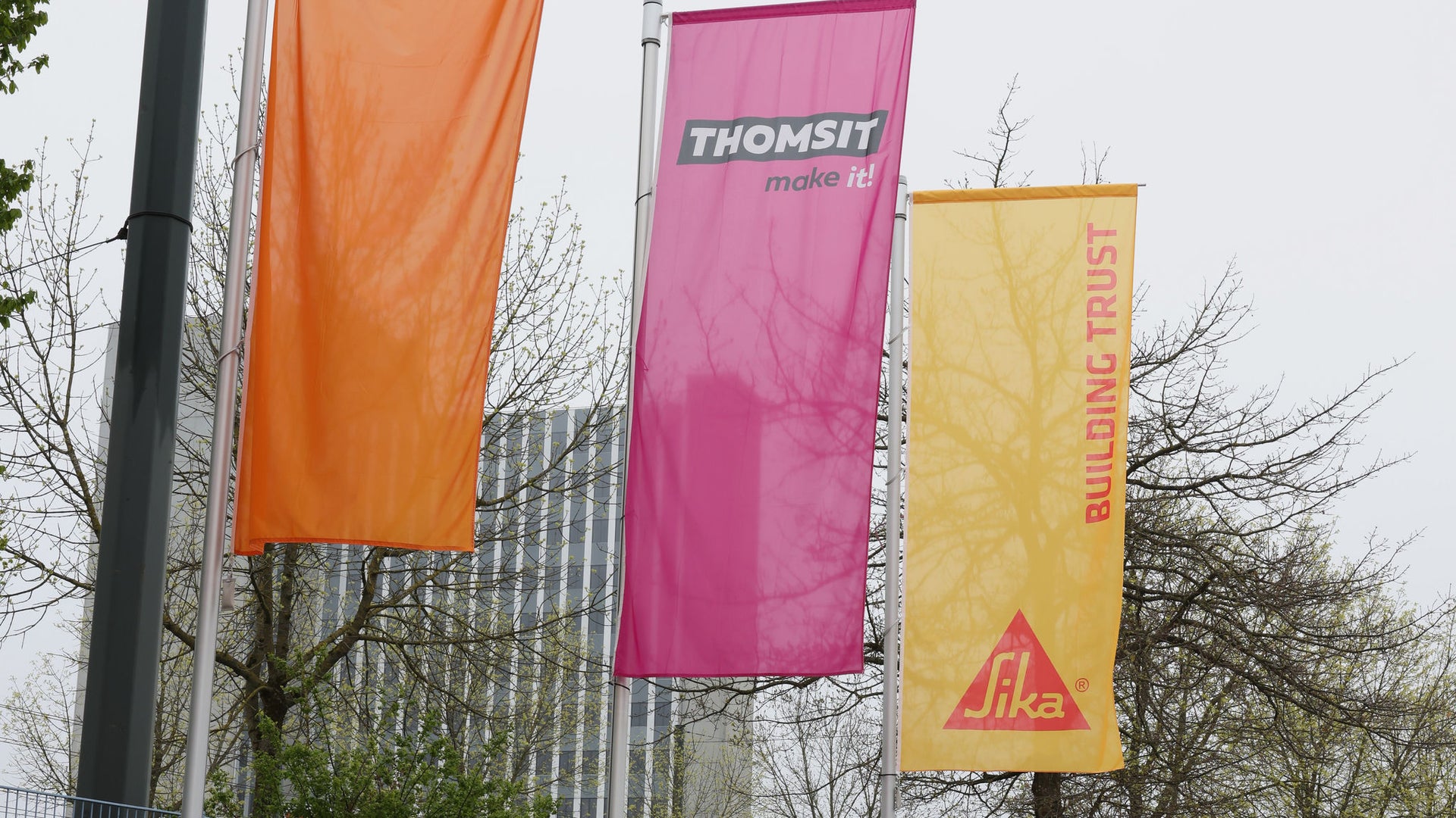 Flags in front of PCI Augsburg GmbH