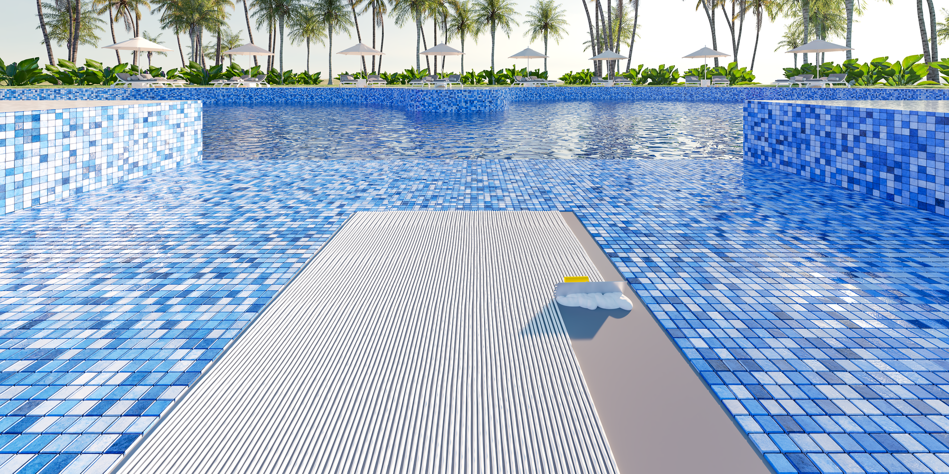 applying tile setting adhesive for blue tiles inside a pool