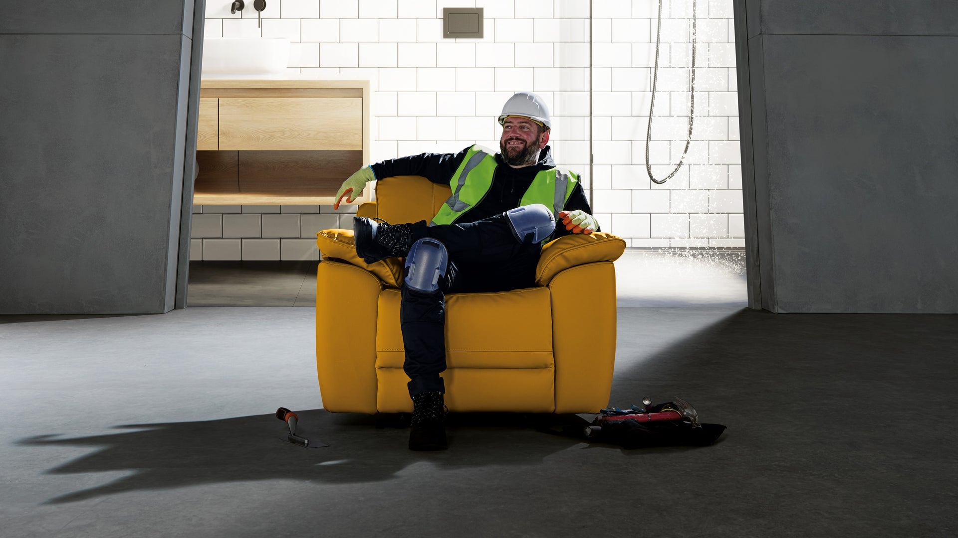 Person in yellow chair in modern interior