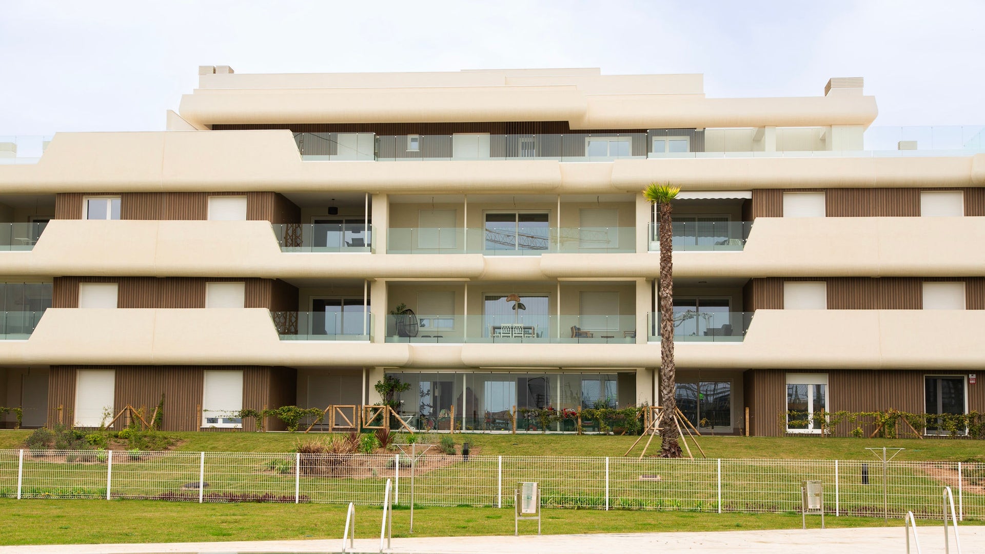 Modern apartment building with pool view