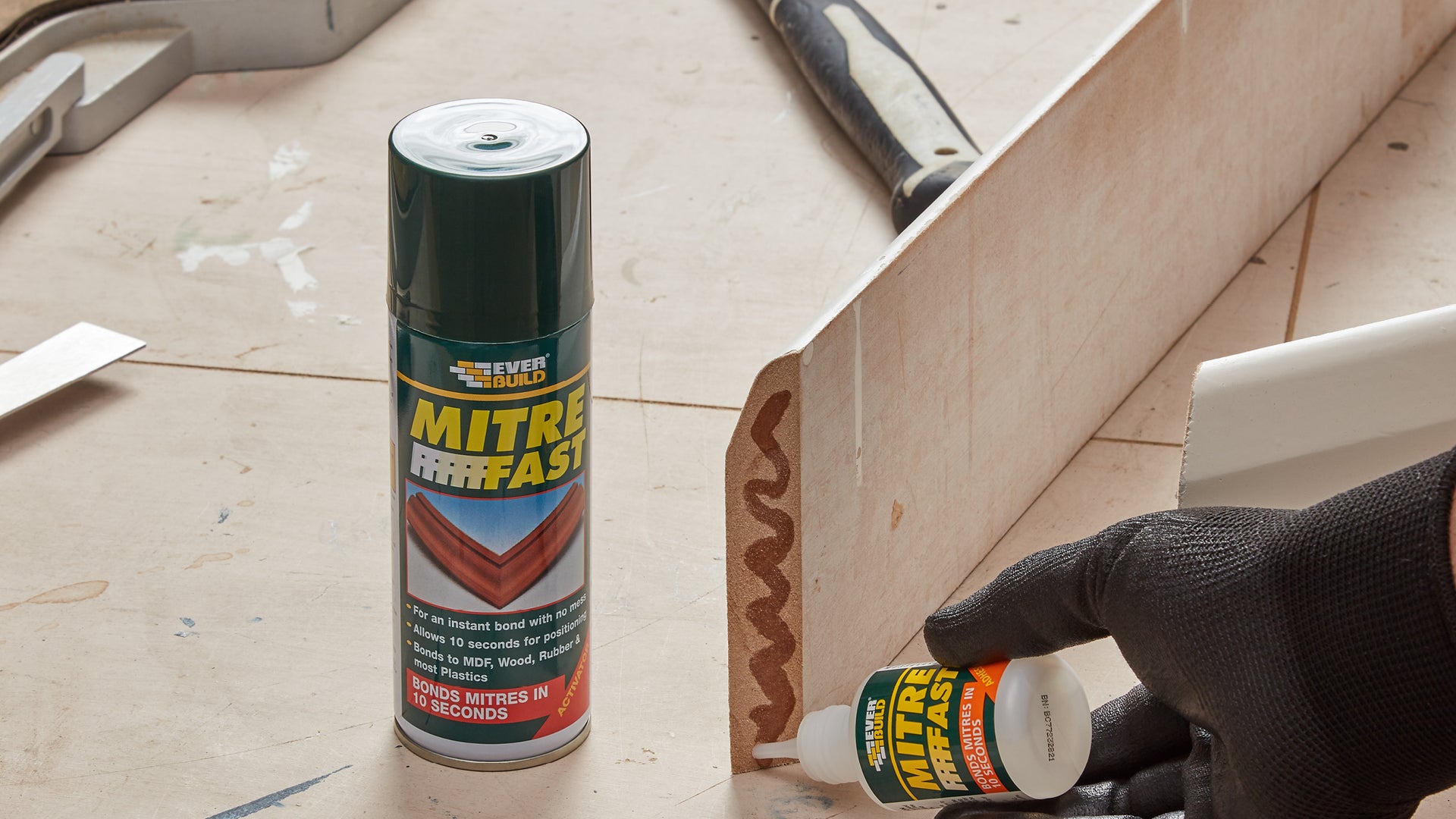Person applying Mitre Fast Adhesive