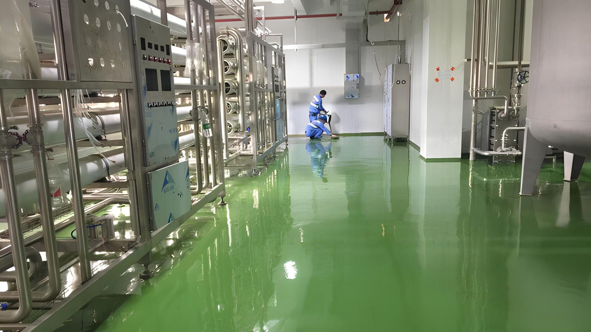 Industrial beverage facility with green flooring