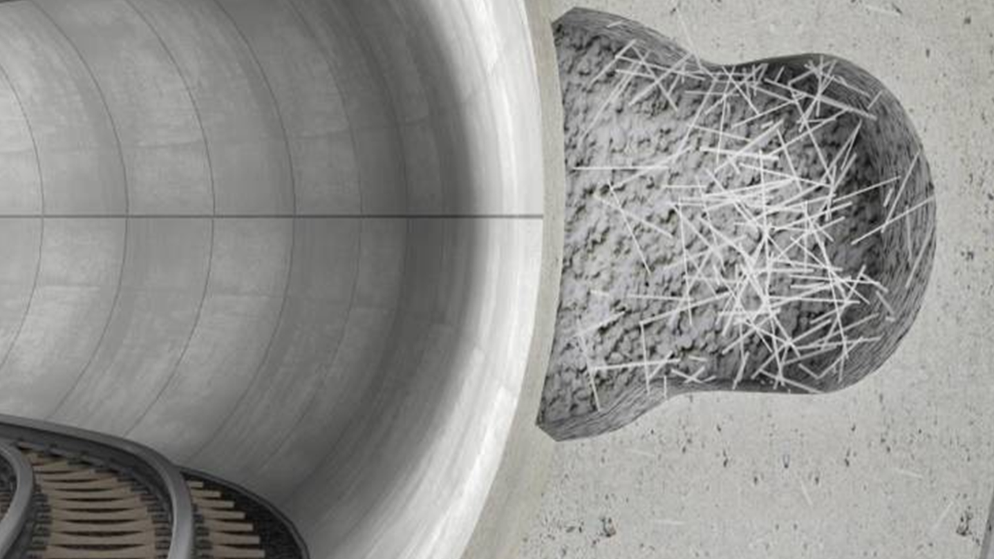 Concrete tunnel cross-section with exposed reinforcement