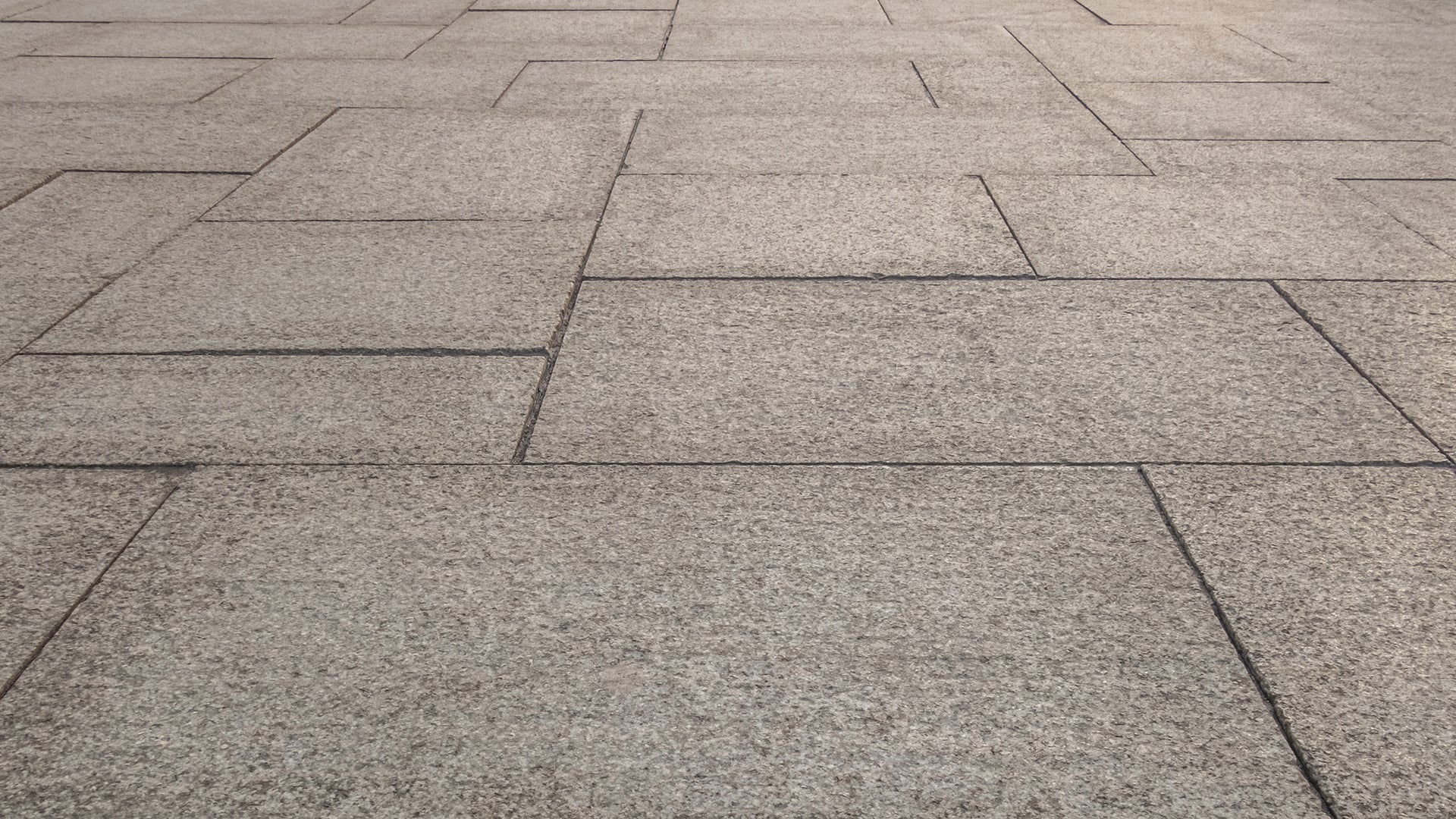 Geometric Pattern of Outdoor Stone Pavement Tiles