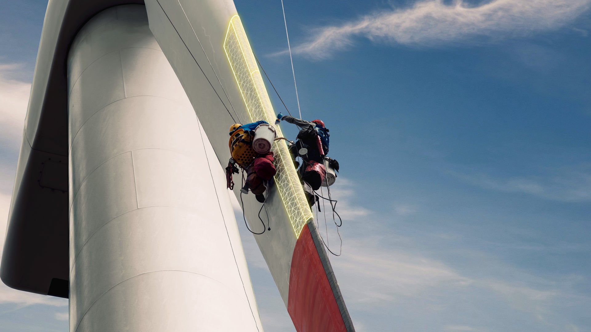 Technicians applying Leading Edge Protection to wind turbine blade